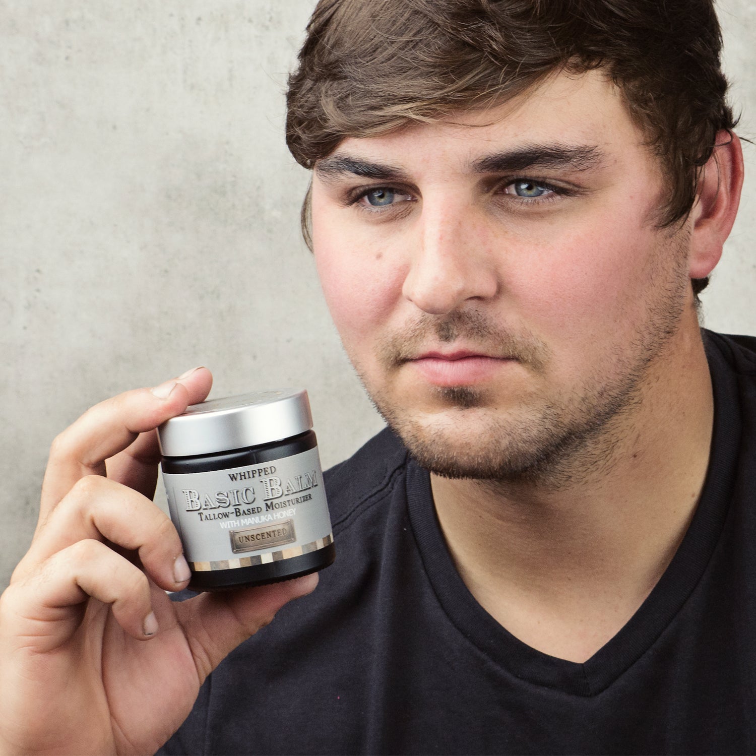 Men's Whipped Tallow and Honey Balm, Unscented, Man Holding Jar