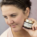 Bakuchiol Anti-Aging Tallow Face Cream, Fresh Fruit, Woman Holding Jar