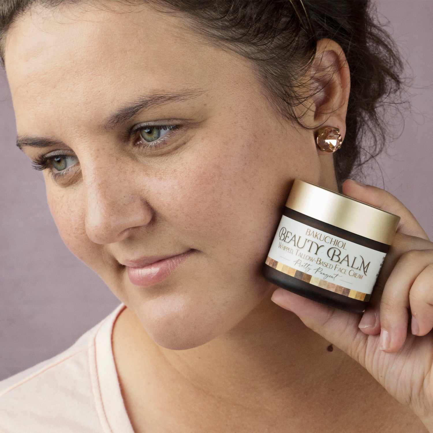 Bakuchiol Anti-Aging Tallow Face Cream, Pretty Pungent, Woman Holding Jar